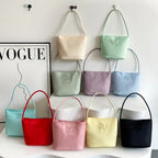 Summer new simple nylon underarm bag Korean niche design alphabet embroidery portable commuter bucket bag