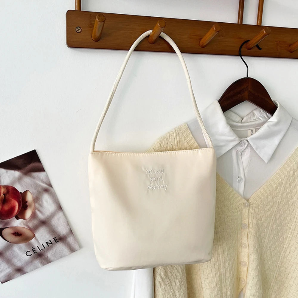 Summer new simple nylon underarm bag Korean niche design alphabet embroidery portable commuter bucket bag