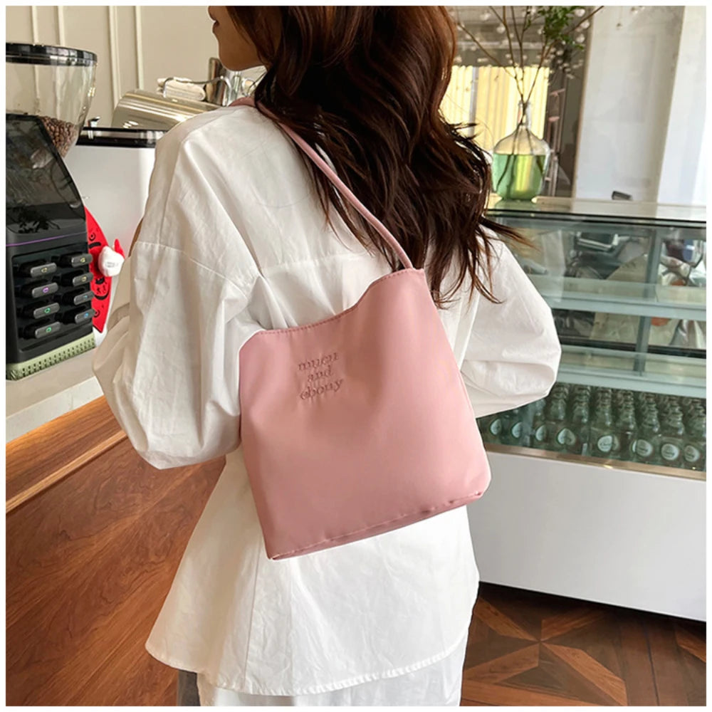 Summer new simple nylon underarm bag Korean niche design alphabet embroidery portable commuter bucket bag