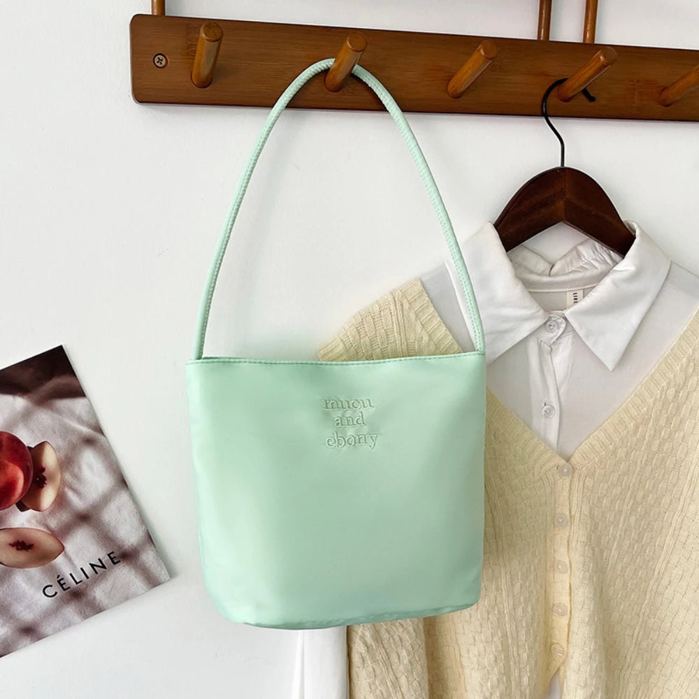 Summer new simple nylon underarm bag Korean niche design alphabet embroidery portable commuter bucket bag