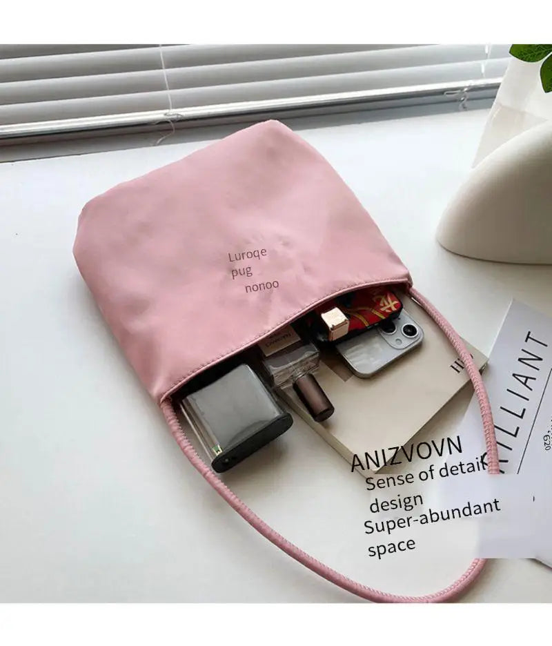 Summer new simple nylon underarm bag Korean niche design alphabet embroidery portable commuter bucket bag